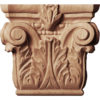 Corinthian wood capitals are carved in a deep relief with rising acanthus leaf and scroll motif