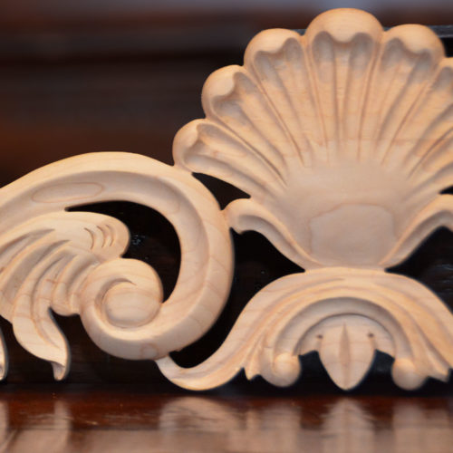 Atlanta center wood carvings are hand carved from premium selected hardwoods. Wood carvings feature carved in deep relief shell motif with scrolled leaf design